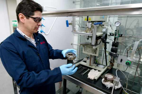 Eduardo Santillan-Jimenez working in a lab