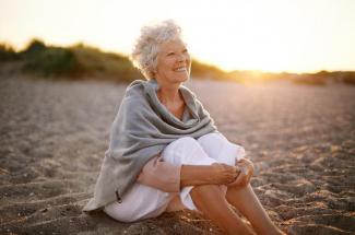 older woman on beach