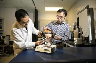 Yu and Huang with their tumor glasses