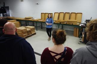 Picture of Liz Adams of the Kentucky Geological Survey conducting a tour of the Earth Analysis Research Library in 2019