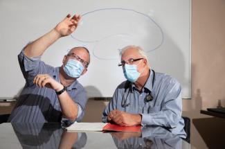 Photo of Drs. Pete Nelson, left, and Gregory A. Jicha, of the Sanders-Brown Center on Aging on July 21, 2020