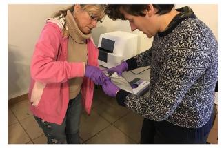 Photo of citizen scientists, Nina McCoy (left), a member of Martin County Concerned Citizens, and Ricki Draper, a member of Livelihoods Knowledge Exchange Network, process water samples at the Martin County Extension office.