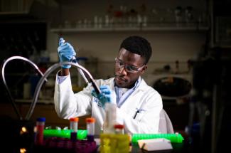 Photo of black researcher in lab