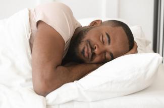 Stock photo of man sleeping