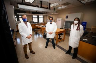 Photo of University of Kentucky researchers James Keck, Scott Berry and Shakira Hobbs in lab