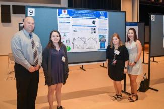 Photo of Craig Wilmhoff, Autumn Gwin, Raegan Simpson and Haley Hurd from Perry County Central High School in Hazard, KY at Appalachian Research Day 2019 