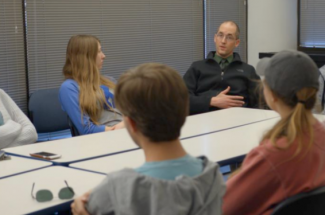 Nathan Vanderford, director of the SHE in Oncology program, also oversees ACTION, Markey's other successful cancer program aimed at high school and college students.