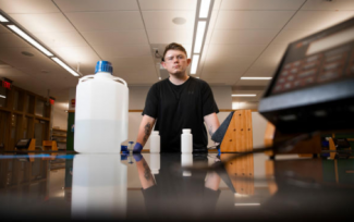 Matthew Farmer, from Harlan, Kentucky, will graduate next week with a degree in chemistry from UK's College of Arts and Sciences. Pete Comparoni | UK Photo.