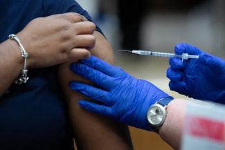 File Photo: UK HealthCare employee receives the COVID-19 vaccine Dec. 17, 2020. Mark Cornelison l UK Photo
