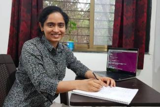Nisheeta Desai, a 2020 UK graduate, has developed a theory that sheds new light on one of the biggest mysteries in theoretical physics. Her work was recently published in Nature Physics. Photo courtesy of Desai.