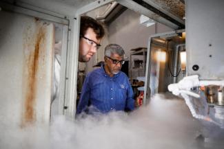 Professor I.S. Jawahir (right) conducting cryogenic material processing experiments with Daniel Caudill (left), mechanical engineering graduate research assistant. Pete Comparoni | UK Photo.