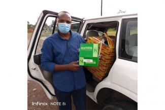 Liberia’s Minister of Health Dr. Wilhemina S. Jallah, MD, MPH, CHES, FLCP, FWACP, with shipment of oxygen regulators that arrived in Liberia to be distributed to COVID-19 patients.