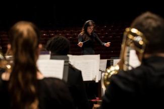 Bove conducts UK Concert Band in a 2018 rehearsal.