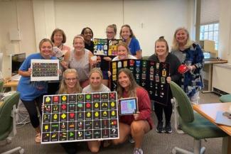 Judith Page and Margaret Bausch are working with students to create an effective communication intervention program. Photo taken in 2019 and provided by the UK College of Education.