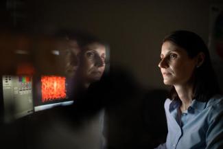 Anika Hartz, a researcher for the Sanders-Brown Center on Aging in the Microscopy Lab on July 1, 2021. 