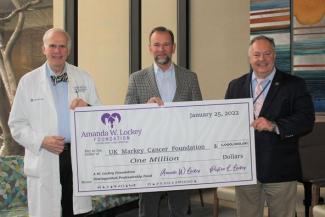 Lowell Anthony, M.D., a medical oncologist at the UK Markey Cancer Center, and Michael Delzotti, Markey Cancer Foundation president & CEO, accept a $1 million gift from the Amanda W. Lockey Foundation to establish a distinguished professorship.