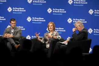 Voices of Hope founder Alex Elswick, CDAR director Sharon Walsh, Ph.D., and then-NIH director Frances Collins, Ph.D., at the 2019 Rx Summit. UK Photo | Mark Cornelison