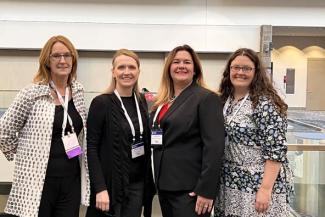 UK's Sharon Walsh, Carrie Oser and Amanda Fallin-Bennett, along with Clark County Health Department's Jennifer Gulley (second from left) presented an update on community engagement in WAVE 1 of UK's HEAL grant at the 2022 Rx and Illicit Drug Summit.