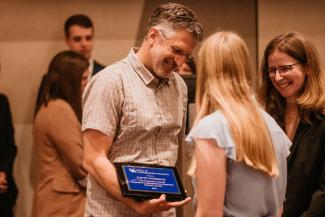 The 2022 Excellent Undergraduate Research Mentor Award winner David Weisrock with students Zoe Hert and Carly Karrick.