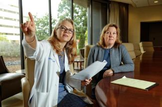 OB-GYN and former BIRCWH scholar Rachel W. Miller, M.D., and her colleague Jill Kolesar, Pharm.D., are co-directors of the Markey Cancer Center Molecular Tumor Board. Mark Cornelison | UK Photo.