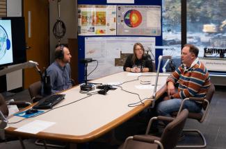 Hosts Matt Crawford (left), Sarah Arpin (middle) and Doug Curl (right) plan for an upcoming episode of the Kentucky Geological Survey podcast, "The Big Blue Rock Pod." Photo by Jeremy Blackburn, Research Communications.
