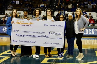 The Pat Summitt Foundation presented a $25,000 check to UK's Sanders-Brown Center on Aging during the women's basketball game on Jan. 26, 2023.
