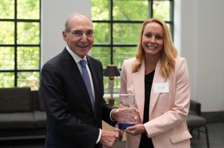 UK President Eli Capilouto presents Melinda Ickes with a 2023-24 University Research Professor award. Jeremy Blackburn | UK Research Communications.