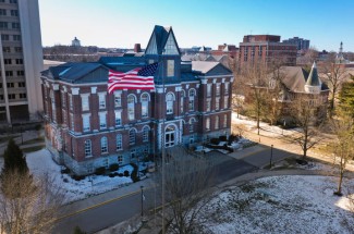 flag flying in front of UK main building