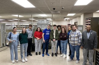 UK undergraduate students work on the Digital Access Project at the Fayette County Courthouse. Photo courtesy of UK College of Arts and Sciences.