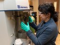 Michela Martinelli, Ph.D., characterizes the graphite’s chemical and physical properties. She is measuring its specific surface area by nitrogen physisorption. Jeremy Blackburn | Research Communications