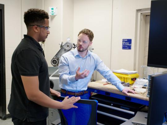 Naol Wolde (left) and Julius Schoop work together in the Institute for Sustainable Manufacturing in the UK College of Engineering.