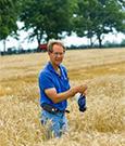 photo of Dave Van Sanford standing in a field