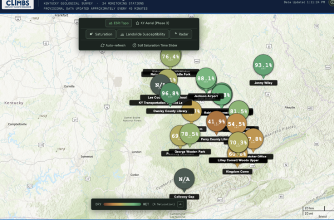 Screenshot of the Kentucky Geological Survey's Slope Hydrologic Monitoring Network dashboard. A map of eastern Kentucky displays monitoring stations with color-coded markers showing soil saturation levels, helping researchers track conditions.